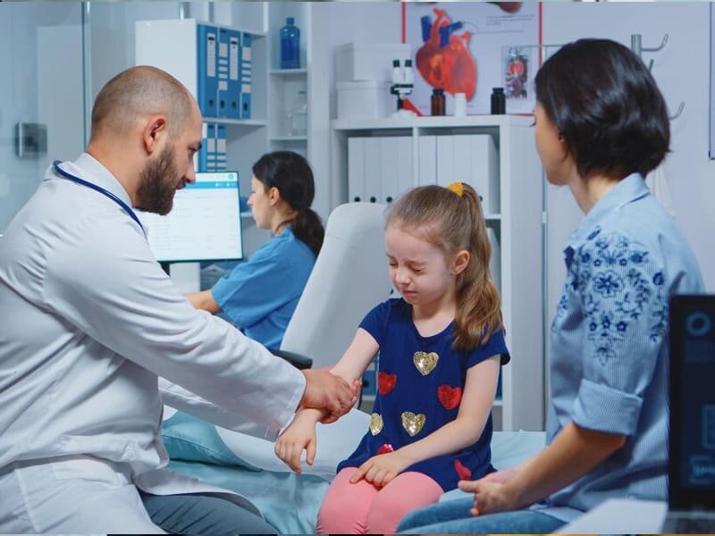 A test patch being applied to a child's skin before laser treatment