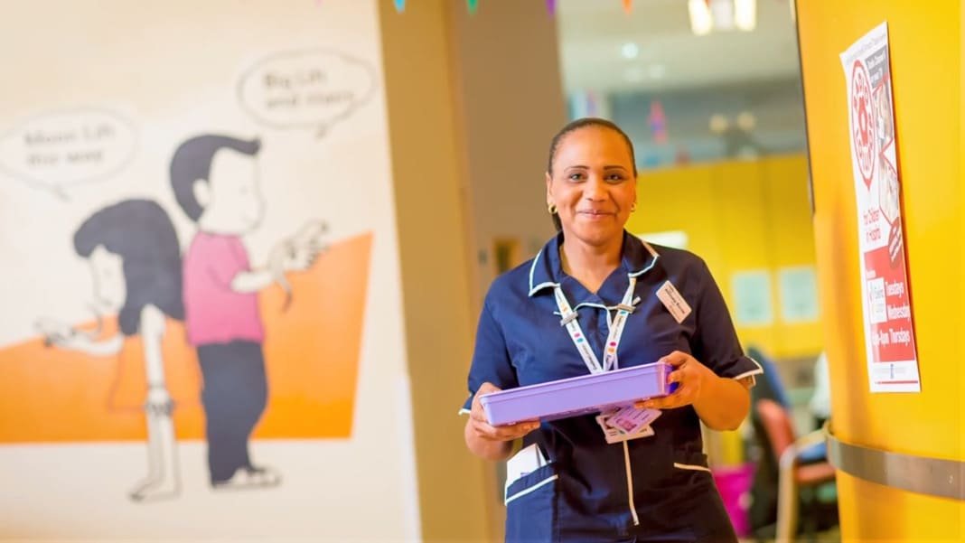 Friendly hospital staff welcoming families at Evelina London Children’s Hospital